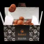 Boite en carton de marrons glacés de la maison Imbert