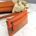 Pochette portefeuille orange et marron