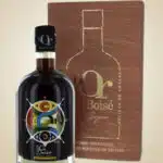 Délices de Guyane : bouteille d'alcool devant un emballage marron