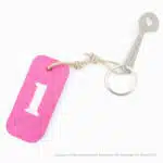 Clé pour caddies, version rose avec chiffre blanc.