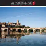un pont au dessus de l'eau Albi derrière